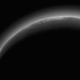 Illustration for article titled What Is This Weird Glowing Spot Hovering Over Pluto?